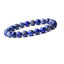 Handmade lapis lazuli stretch bracelet with polished 8mm deep blue round beads and contrasting natural mineral markings.