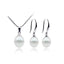 white pearl pendant and earring set